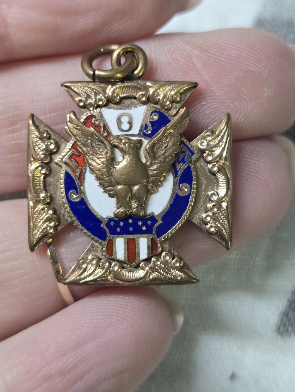 Antique fraternal order badge, specifically a FOB pendant charm.